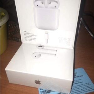 Two brand new air pods sealed.